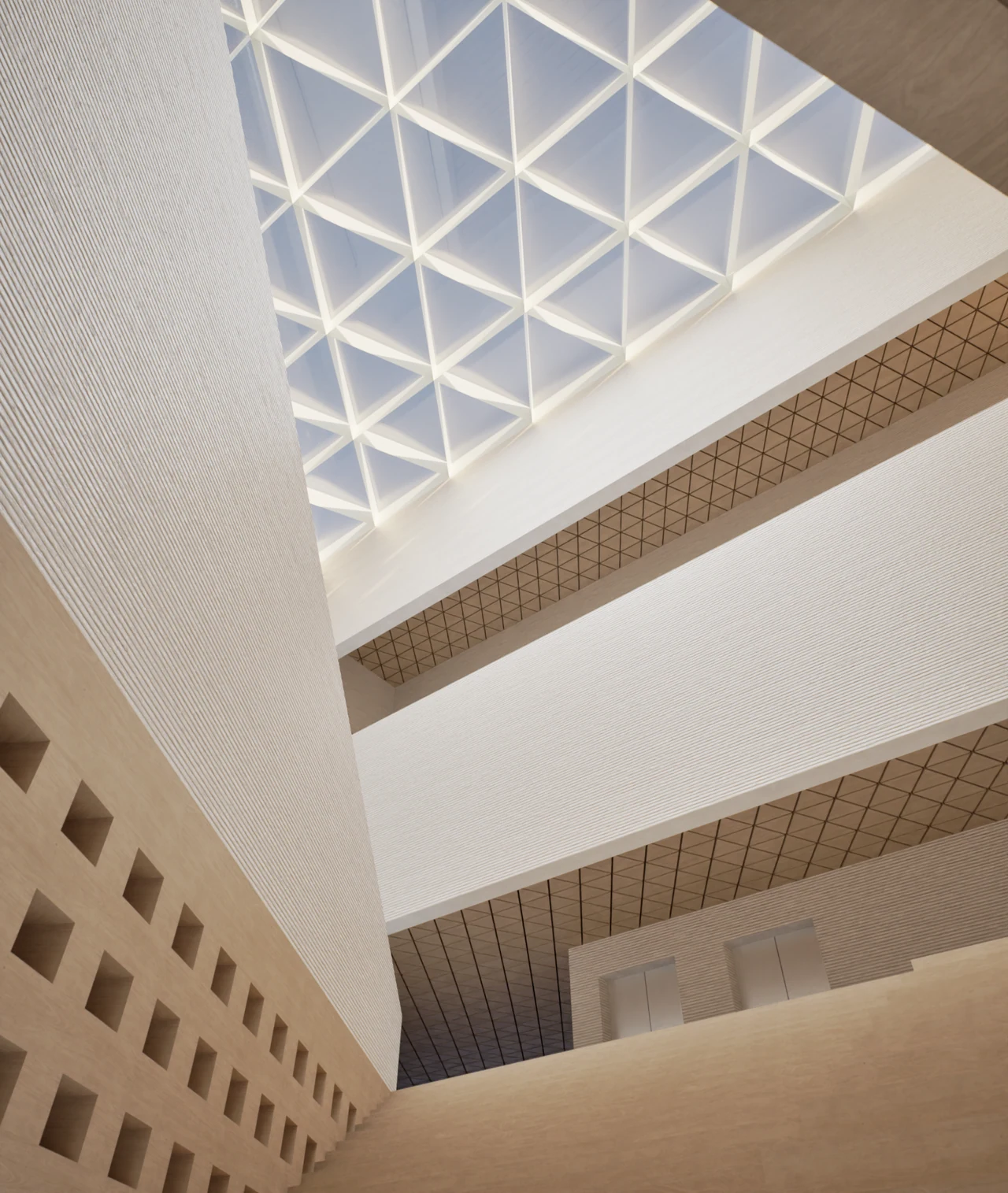 Triangular skylight above a pale timber interior