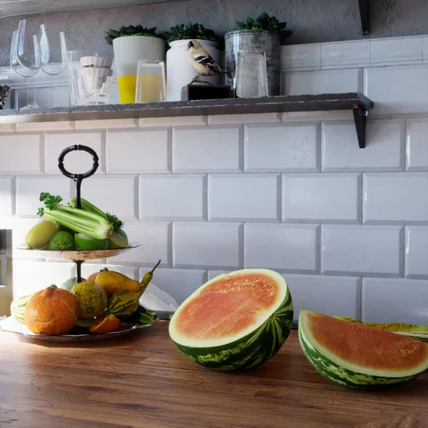 Sunlit kitchen with fruit and plants — view 3