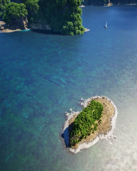 Palm-covered islands in turquoise water — view 4