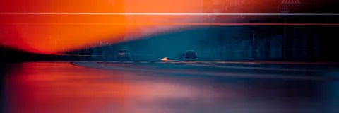 Neon architecture and vehicle light trails — view 4