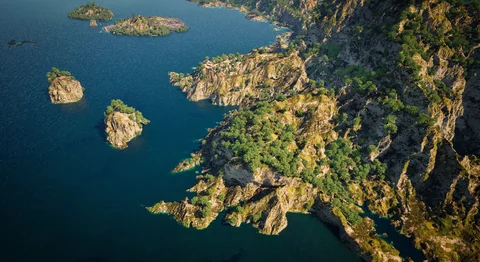 Coastal islands, boats and changing light — view 2