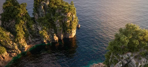Rocky tropical islands and marine scenery — view 8