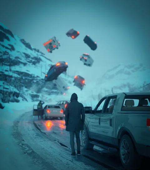 Cars suspended over a snowy road — view 7
