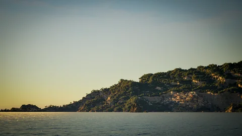 Rocky coastline in warm late-day light