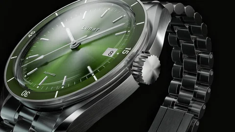 Steel wristwatch with a green dial