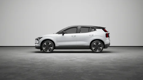 Silver vehicle in profile under studio lighting