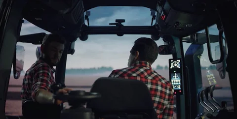 Operator inside a forestry vehicle cabin
