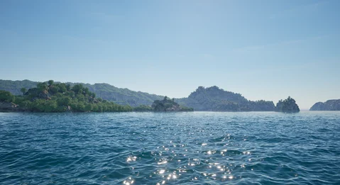 Sunlit water between forested islands