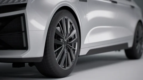 Close-up of a front wheel and vehicle bodywork