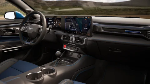 Driver's view of a vehicle dashboard and cabin