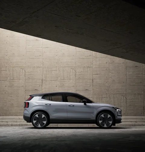 Silver Volvo in a concrete architectural setting — view 1