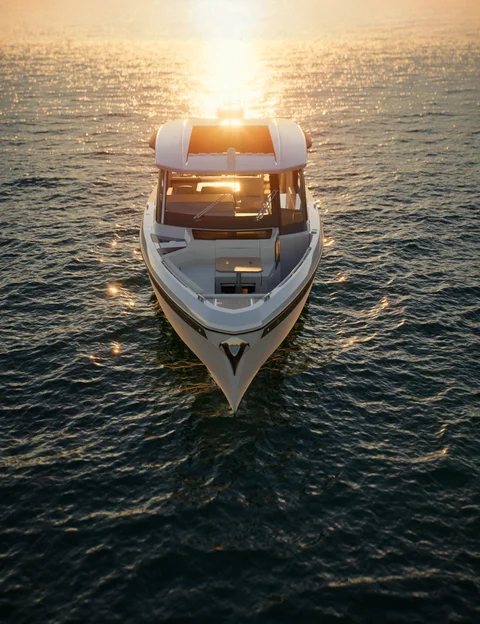 Motorboat seen from above in evening light