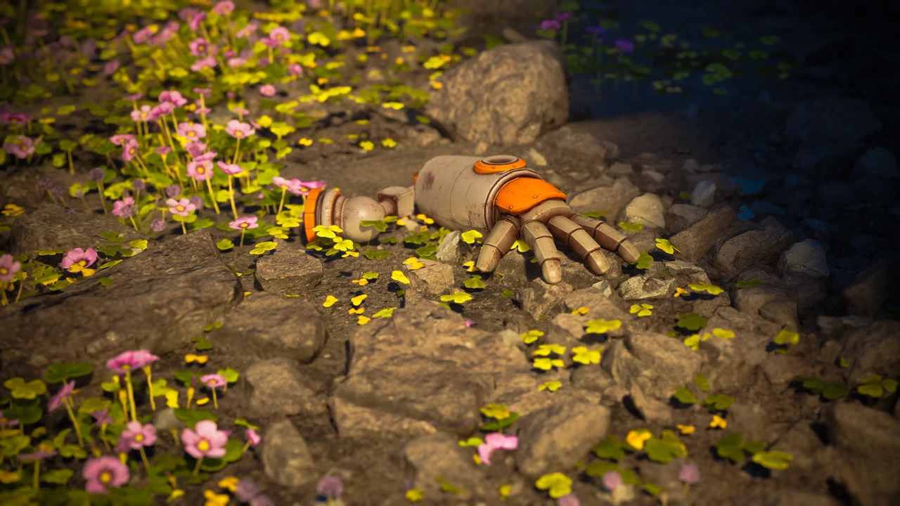 Small orange robot surrounded by plants in a rocky setting