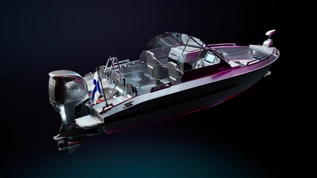 Motorboat illuminated in a dark studio